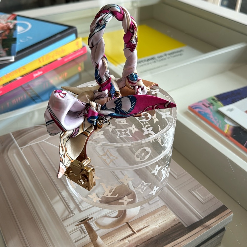 Louis Vuitton jewelry case bag clear.